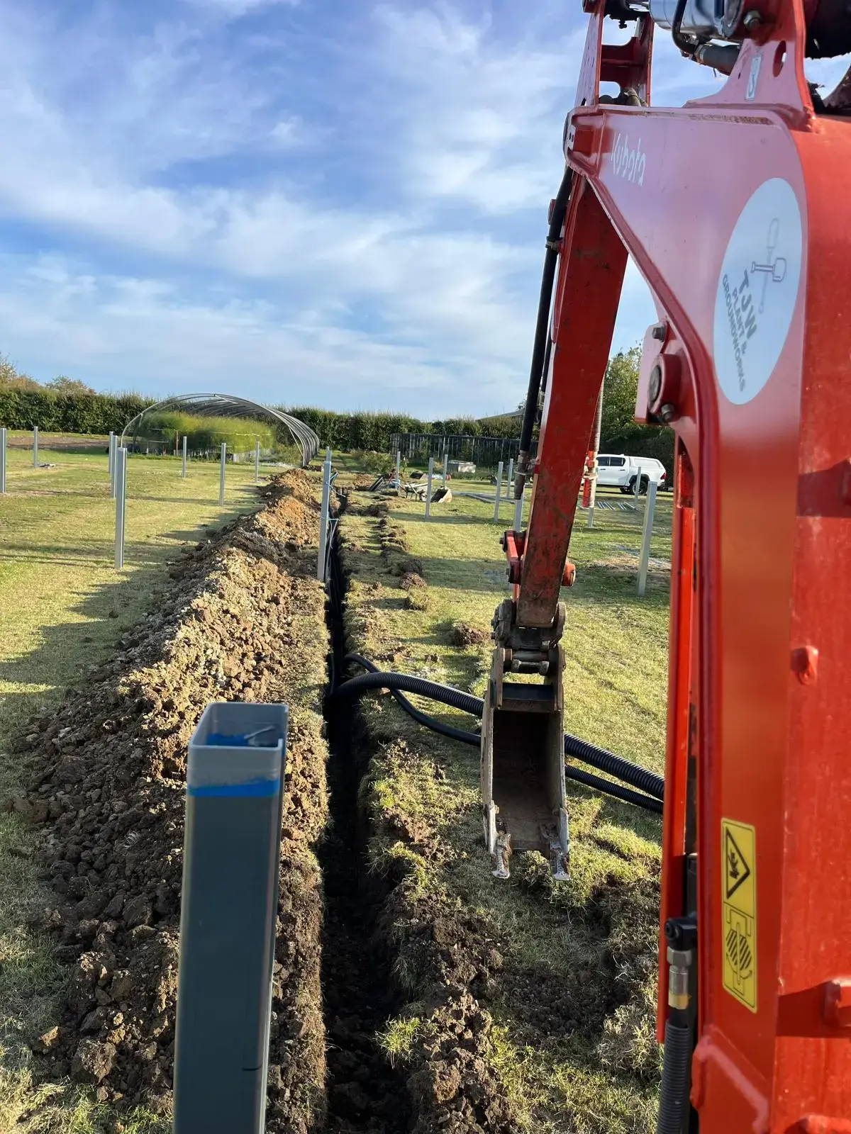 Utility trenching with an excavator
