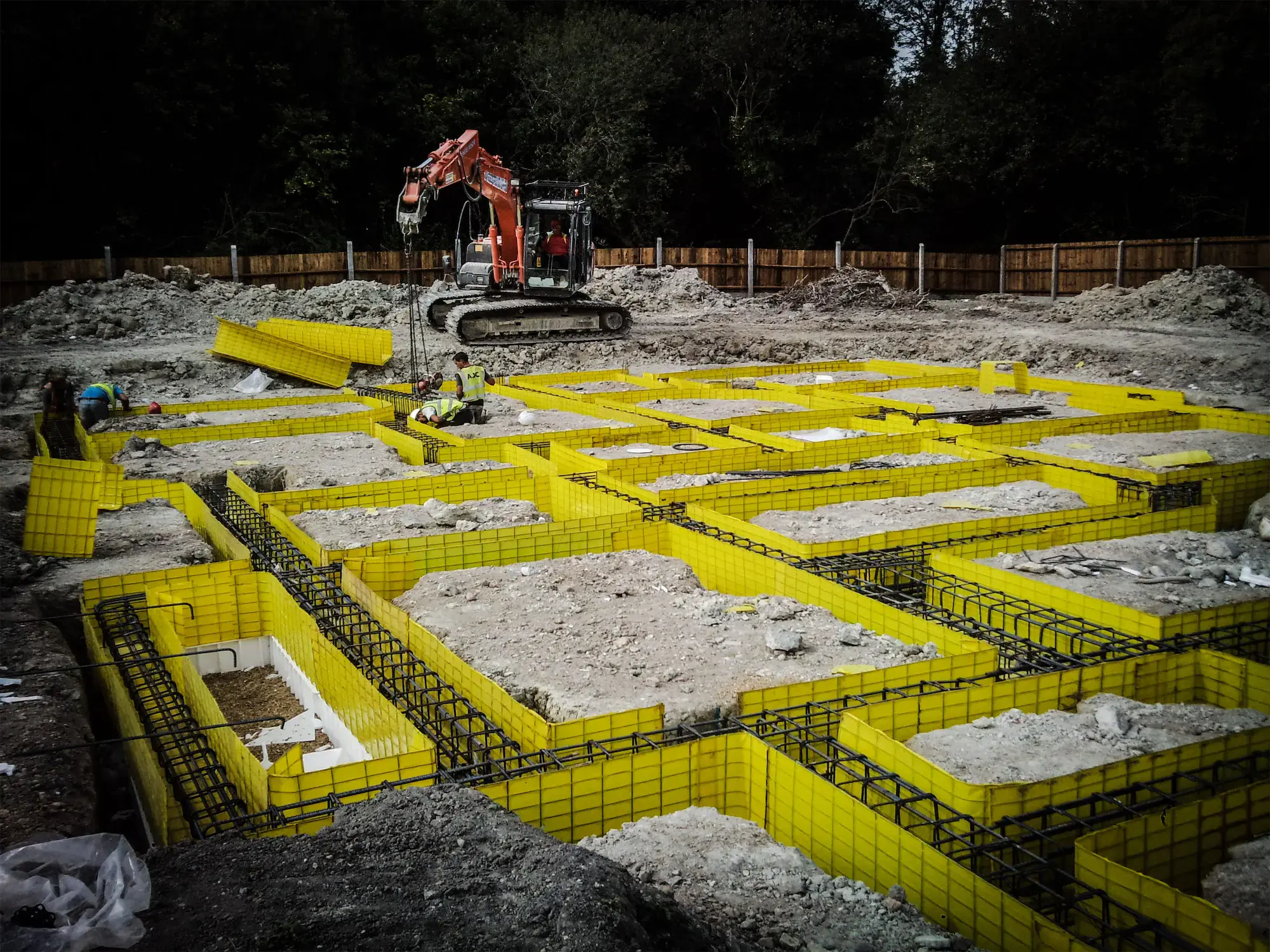Reinforced foundations with yellow formwork