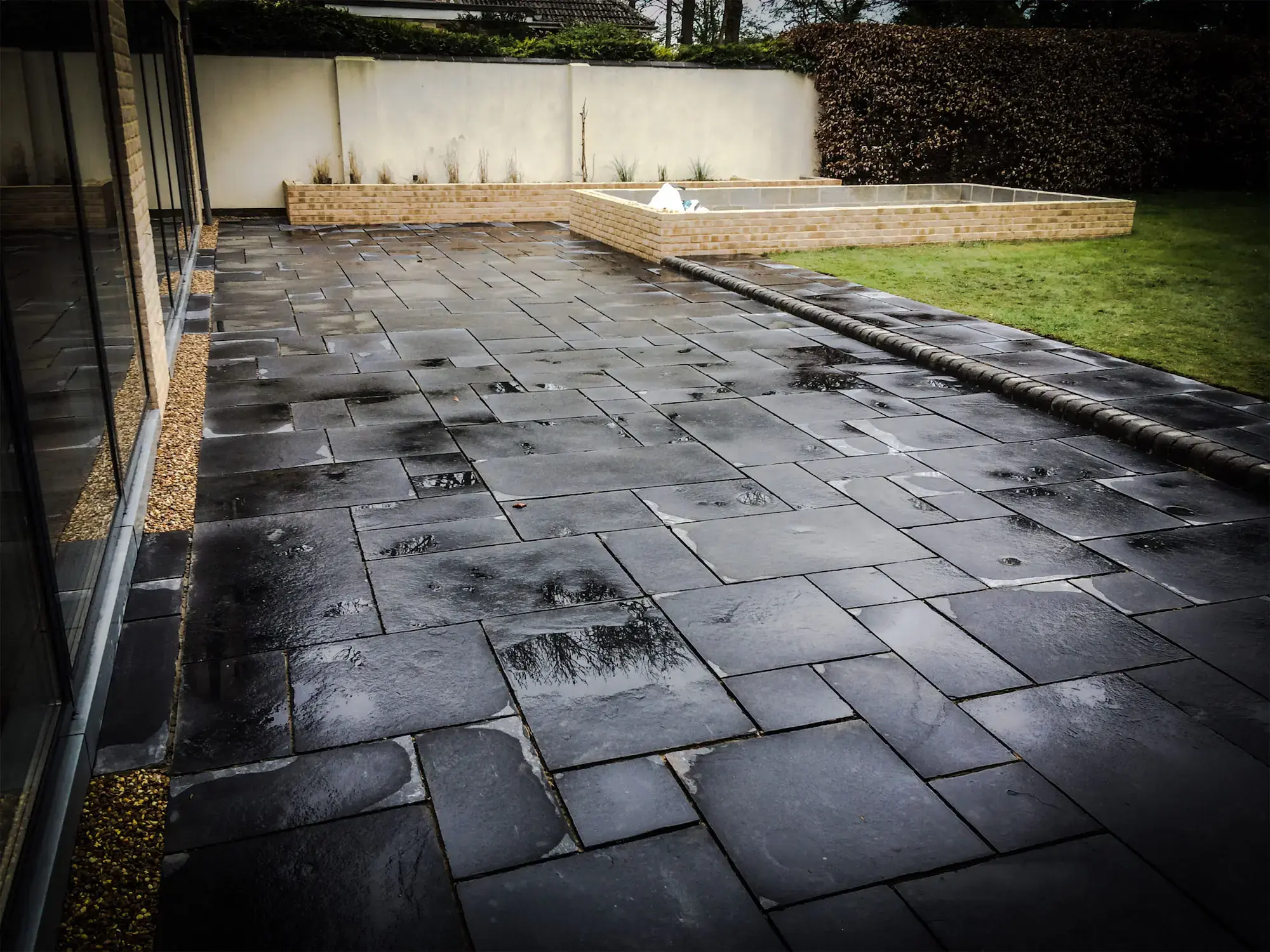 Completed dark stone patio